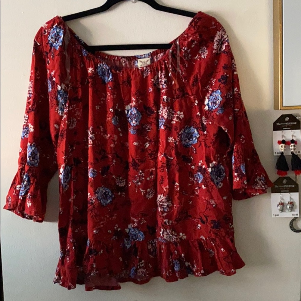 Red flowery blouse